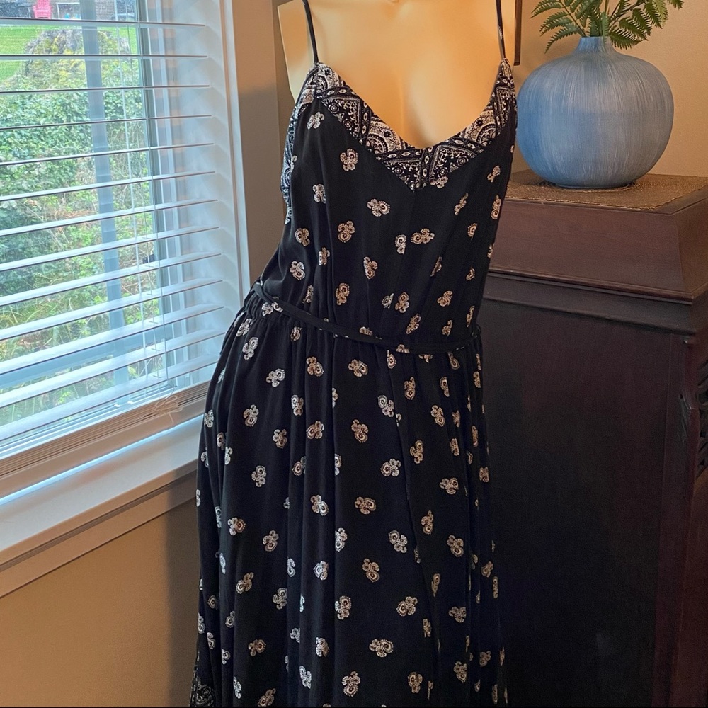 Handkerchief bottom spaghetti strap dress.